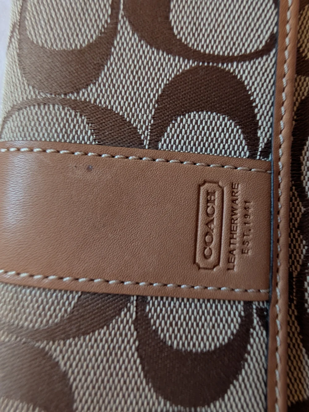 COACH Men’s Signature Canvas Trifold Wallet in Brown/Tan